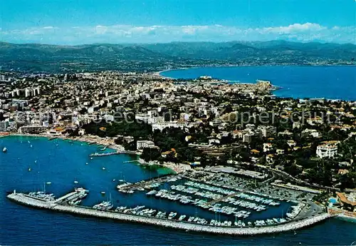 AK / Ansichtskarte Juan les Pins Vue aerienne Cap dAntibes et la Ville d Antibes Juan les Pins