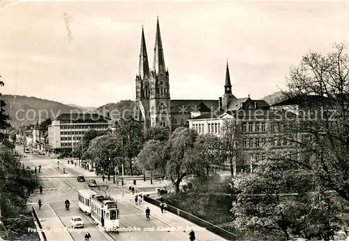 AK / Ansichtskarte Strassenbahn Freiburg Breisgau Dreisambr?cke Kirche St. Johann  