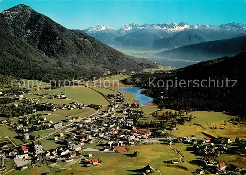 AK / Ansichtskarte Seefeld_Tirol mit Inntal und Kalkkoegel Alpenpanorama Fliegeraufnahme Seefeld Tirol