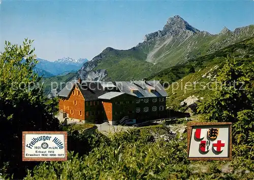 Dalaas Freiburger Huette mit Roggelskopf Alpen Dalaas