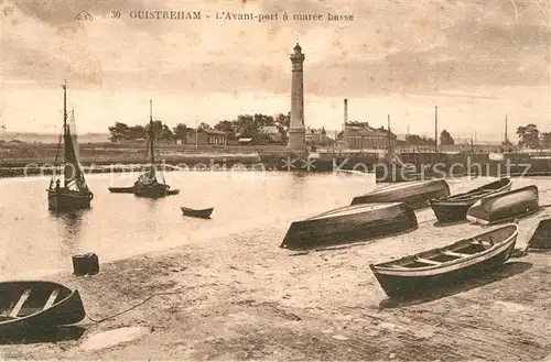 Ouistreham Avant port a maree basse bateaux phare Ouistreham