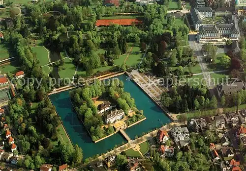 AK / Ansichtskarte Bad_Pyrmont Kurpark mit Schloss Fliegeraufnahme Bad_Pyrmont