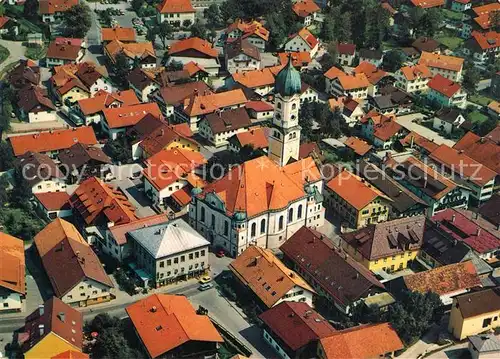 AK / Ansichtskarte Nesselwang Fliegeraufnahme mit Pfarrkirche St Andreas Nesselwang