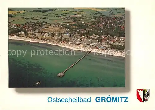 AK / Ansichtskarte Groemitz_Ostseebad Fliegeraufnahme mit Seebruecke Groemitz_Ostseebad