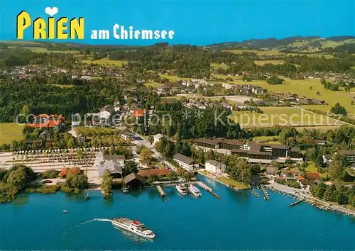 AK / Ansichtskarte Prien_Chiemsee Dampferhafen Schiffsanlegestelle Fliegeraufnahme Prien Chiemsee