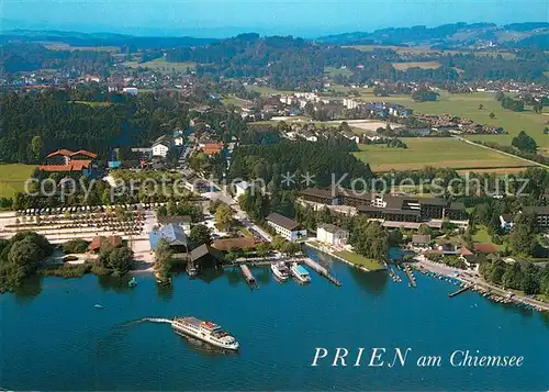 AK / Ansichtskarte Prien_Chiemsee Dampferhafen und Schiffsanlegestelle Fliegeraufnahme Prien Chiemsee
