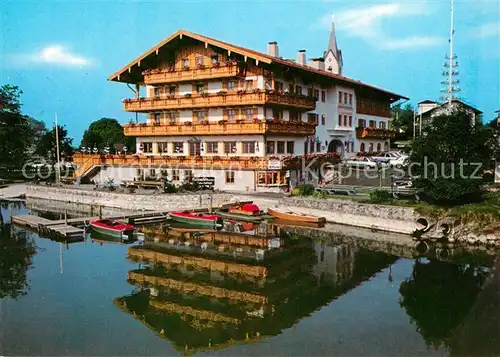 AK / Ansichtskarte Seebruck_Chiemsee Hotel Cafe Wassermann am See Anleger Seebruck Chiemsee