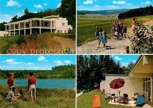 AK / Ansichtskarte Herbstein Kolping Feriendorf Uferpartie am See Wandern Herbstein