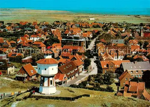 AK / Ansichtskarte Langeoog_Nordseebad mit Leuchtturm Langeoog_Nordseebad
