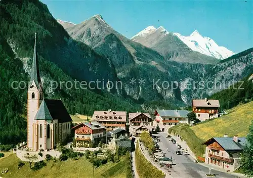 AK / Ansichtskarte Heiligenblut_Kaernten Ortsansicht mit Kirche und Grossglockner Heiligenblut Kaernten