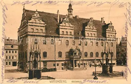 AK / Ansichtskarte Wittenberg_Lutherstadt Rathaus Lutherdenkmal Melanchthon Denkmal Wittenberg_Lutherstadt