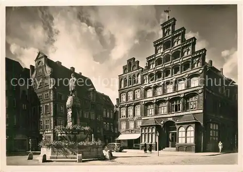 AK / Ansichtskarte Lueneburg Suelfmeister und Giebelhaeuser Am Sande Brunnen Lueneburg