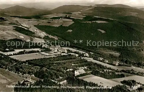 AK / Ansichtskarte Winterberg_Hochsauerland Heilklimatischer Kurort Fliegeraufnahme Winterberg_Hochsauerland