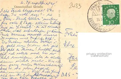 AK / Ansichtskarte Groemitz_Ostseebad Strandpartie Seebruecke Groemitz_Ostseebad