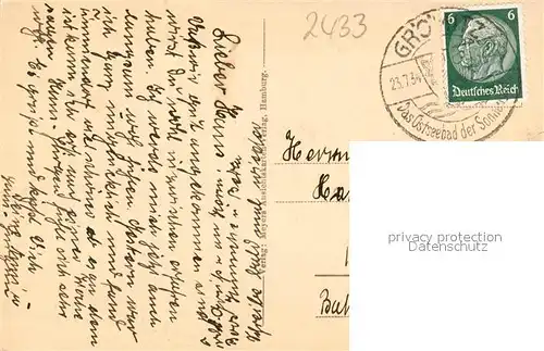 AK / Ansichtskarte Groemitz_Ostseebad Strand mit Promenade Groemitz_Ostseebad