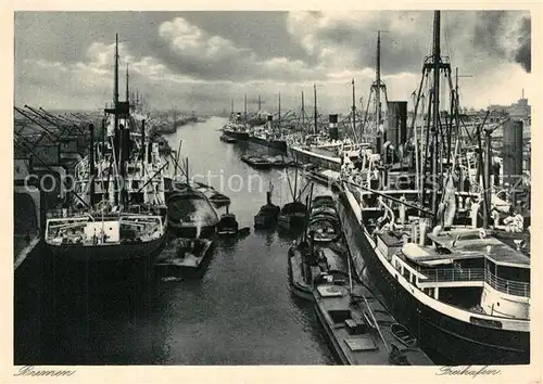 AK / Ansichtskarte Hafenanlagen Bremen Freihafen Schiffe  