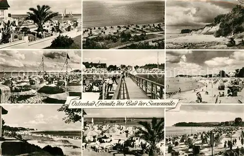 AK / Ansichtskarte Groemitz_Ostseebad Strandpartien Seebruecke Steilufer Groemitz_Ostseebad