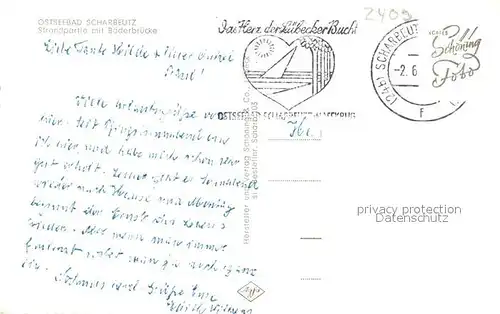 AK / Ansichtskarte Scharbeutz_Ostseebad Strandpartie mit Baederbruecke Scharbeutz_Ostseebad