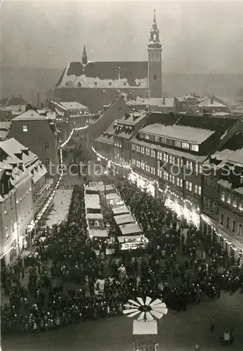 AK / Ansichtskarte Schneeberg_Erzgebirge zur Weihnachtszeit Blick zur Kirche Nachtaufnahme Schneeberg Erzgebirge