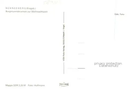 AK / Ansichtskarte Schneeberg_Erzgebirge Bergmannsbrunnen zur Weihnachtszeit Nachtaufnahme Schneeberg Erzgebirge