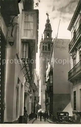 AK / Ansichtskarte Sevilla_Andalucia La Giralda desde la Calle de Placentines Sevilla_Andalucia