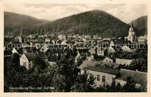 AK / Ansichtskarte Bad_Friedrichroda Stadtbild mit Kirche und Berg Gottlob Bad_Friedrichroda