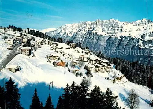 AK / Ansichtskarte Flums_SG Flumserberge Tannenbodenalp Ferienhaeuser Waldhaus Wintersportplatz Alpen Flums_SG