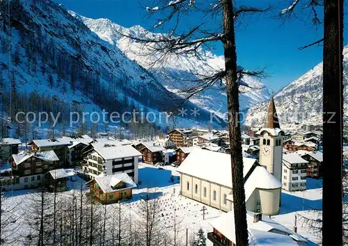 AK / Ansichtskarte Almagell_VS Ortsansicht mit Kirche Walliser Alpen Winterpanorama Almagell VS