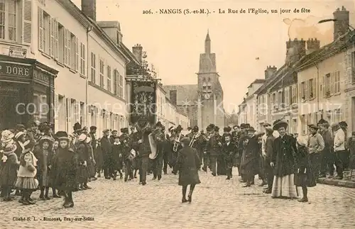 AK / Ansichtskarte Nangis La Rue de l Eglise  Nangis