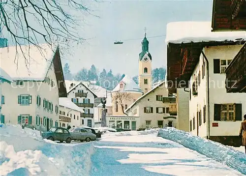 AK / Ansichtskarte Bad_Kohlgrub Ortsmotiv mit Kirche im Winter Bad_Kohlgrub