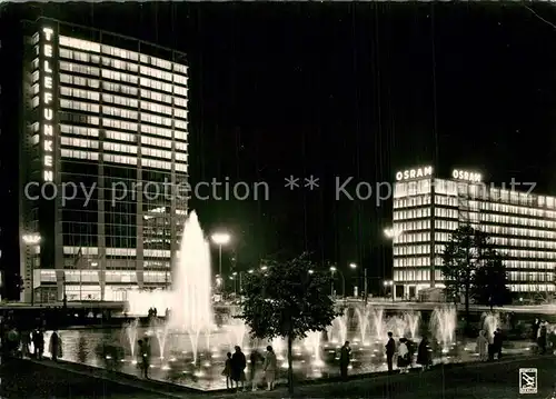 AK / Ansichtskarte Berlin Ernst Reuter Platz Wasserspiele Nachtaufnahme Berlin