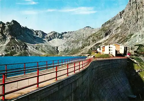 AK / Ansichtskarte Luenersee_Vorarlberg Staumauer Stausee mit Douglashuette Alpen Luenersee Vorarlberg