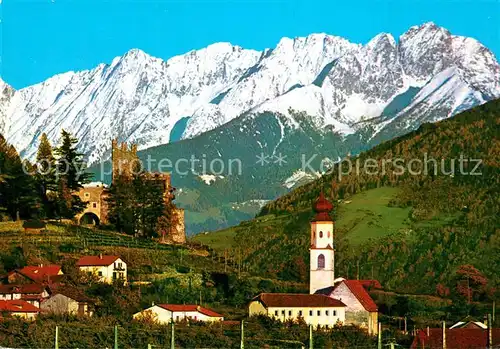 AK / Ansichtskarte Naturns Ortsansicht mit Kirche Burgruine Vinschgau gegen Ifinger Sarntaler Alpen Naturns