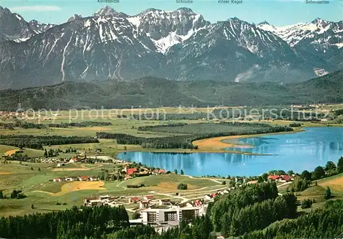 AK / Ansichtskarte Hopfen_See Panorama Kurzentrum Enzensberg Tiroler Alpen Fliegeraufnahme Hopfen_See
