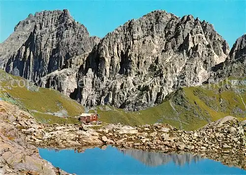 AK / Ansichtskarte Innsbruckerhuette am Pinnisjoch Bergsee Blick gegen Kalkwand Stubaier Alpen Innsbruckerhuette