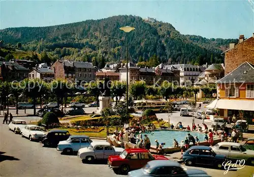 AK / Ansichtskarte La_Bourboule Place M. Bouchaudy Jet d eau Hotels La_Bourboule