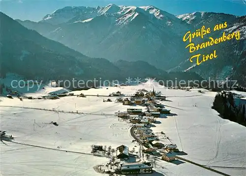 AK / Ansichtskarte Brandenberg_Tirol Gebirgsdorf Winterlandschaft mit Rofangebirge Fliegeraufnahme Brandenberg Tirol