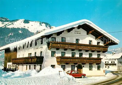 AK / Ansichtskarte Koessen_Tirol Pension Auwirt im Winter Koessen Tirol