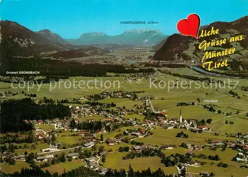 AK / Ansichtskarte Muenster_Tirol Fliegeraufnahme mit Kaisergebirge Muenster_Tirol