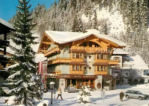 AK / Ansichtskarte Filzmoos Hotel Hubertus im Winter Wintersportplatz Alpen Filzmoos