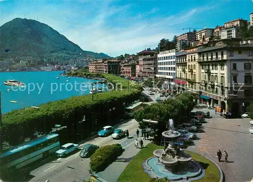 AK / Ansichtskarte Lugano_Lago_di_Lugano Panorama mit Blick zum Monte San Salvatore Lugano_Lago_di_Lugano