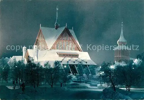 AK / Ansichtskarte Kiruna Kyrkan Kirche Nachtaufnahme im Winter Kiruna