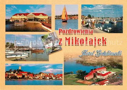 AK / Ansichtskarte Mikolajki_Ostpreussen Stadtansicht Hotel Hafen Segelboote Spirdingsee Fliegeraufnahme Mikolajki_Ostpreussen