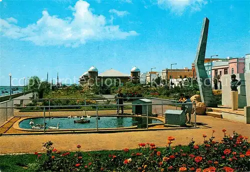 AK / Ansichtskarte Olhao Monumento ao Patrao Joaquim Lopes Jardim Marginal e Mercados Denkmal Park Gaerten Markt Olhao