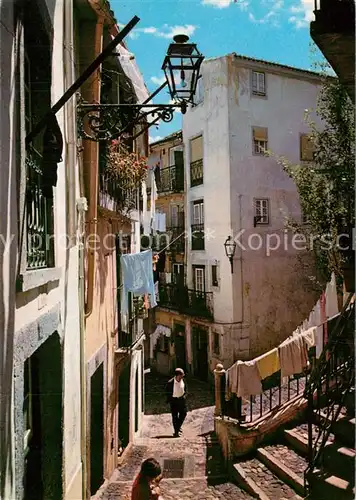AK / Ansichtskarte Lisboa Rua tipica de Alfama Lisboa