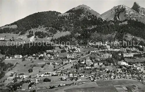 AK / Ansichtskarte Leysin et la Tour d Ai Alpes vue aerienne Leysin