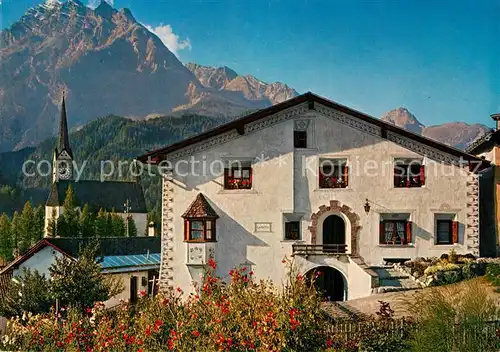 AK / Ansichtskarte Scuol_GR Engadiner Haus Kirche Alpen Scuol_GR