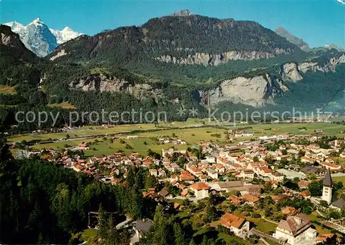 AK / Ansichtskarte Meiringen_BE Panorama gegen Wetterhorngruppe Berner Alpen Fliegeraufnahme Meiringen BE