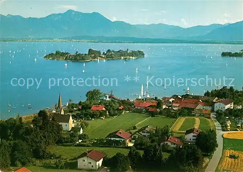 AK / Ansichtskarte Gstadt_Chiemsee Fraueninsel und Hochgern Chiemgauer Alpen Fliegeraufnahme Gstadt_Chiemsee
