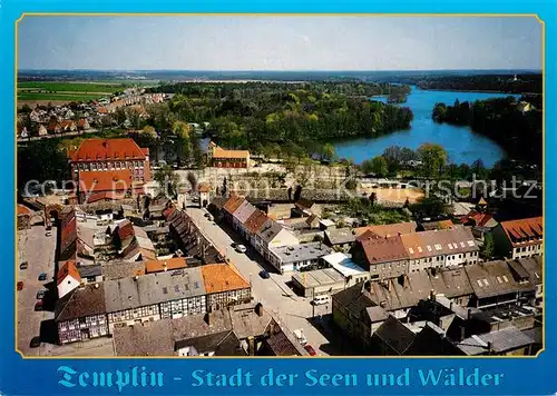 AK / Ansichtskarte Templin Stadtbild mit Templiner See und Stadtmauer Fliegeraufnahme Templin